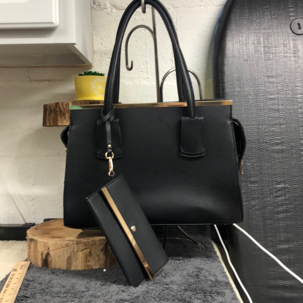 Black leather Satchel with matching wristlet new without tags